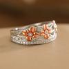 Luxury Two-tone Hollow Flower Synthetic Gemstone Ring Copper Material Women Jewelry Ring For Banquet