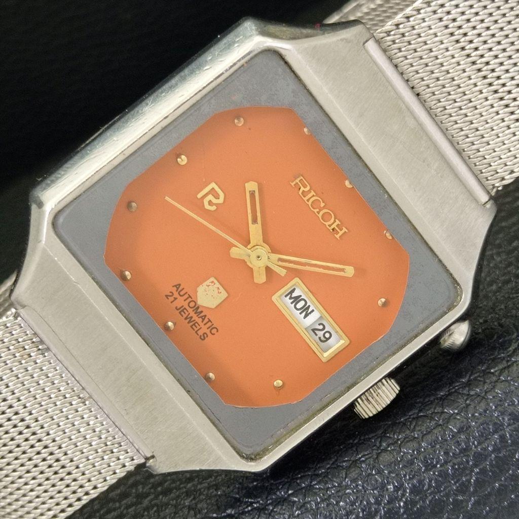 

ВИНТАЖНЫЕ АВТОМАТИЧЕСКИЕ ЧАСЫ RICOH R31 ЯПОНИЯ МУЖСКИЕ ОРАНЖЕВЫЙ ЦИФЕРБЛАТ a500613-5 R153-a500613
