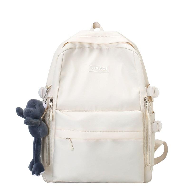 Schoolbag high value solid color backpack schoolbag Japanese campus simple versatile light flash class large capacity double backpack