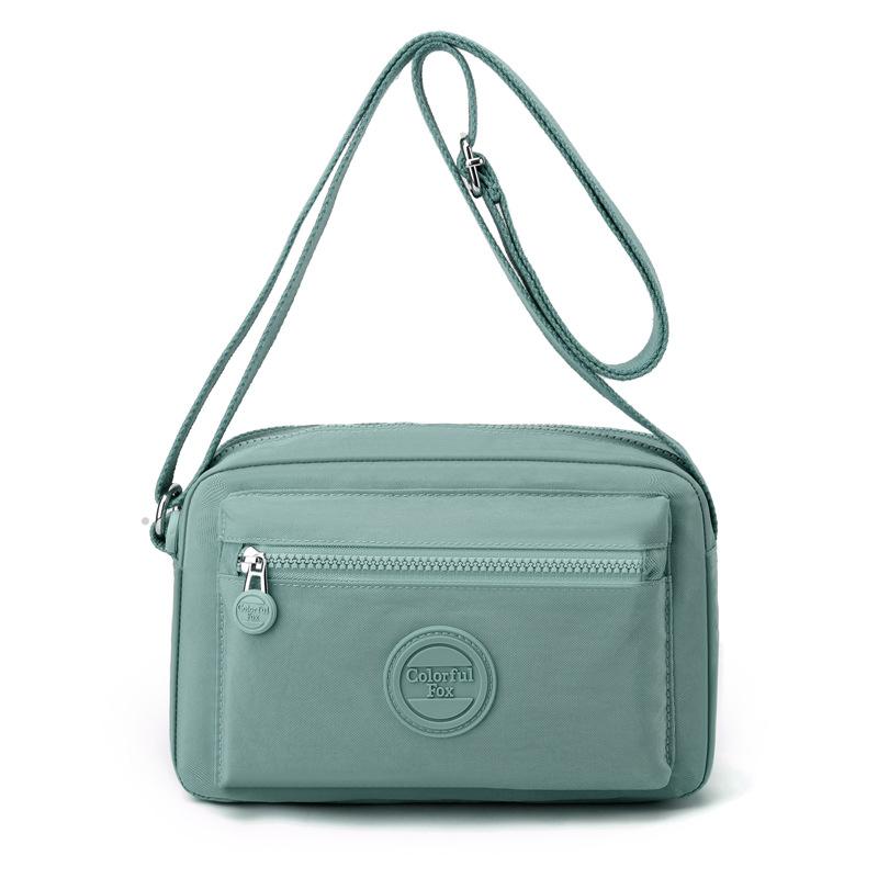 New Macaron shoulder bag women's fashion trend messenger bag multi-layer mobile phone bag