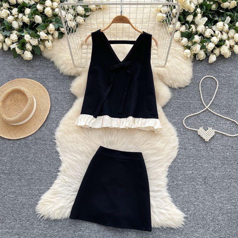 

Online Celebrity Ins Niche Popular High-Grade Sense Summer Clothing Two-piece Set Sleeveless Loose Bow Vest High Waist Skirt Black L