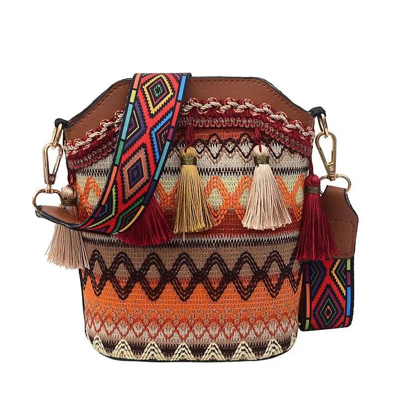 

Eye - Catching Embroidered Crossbody Bag: Rich Maroon Base with Exquisite Tribal - Inspired Designs and Tassel Details коричневый