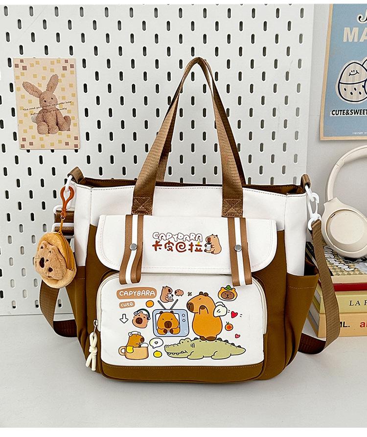 School bag 2025 new large-capacity cartoon multi-compartment high-value school bag Korean version commuting simple make-up bag lightweight backpack