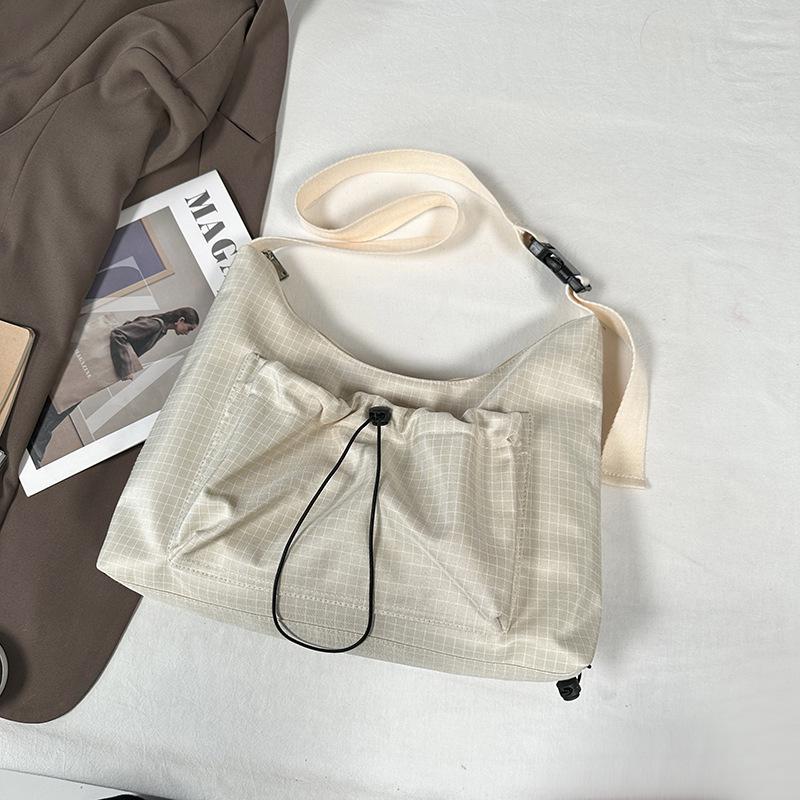 Korean Style Plaid Dumpling Bag: Women's 2026 Versatile Drawstring Crossbody