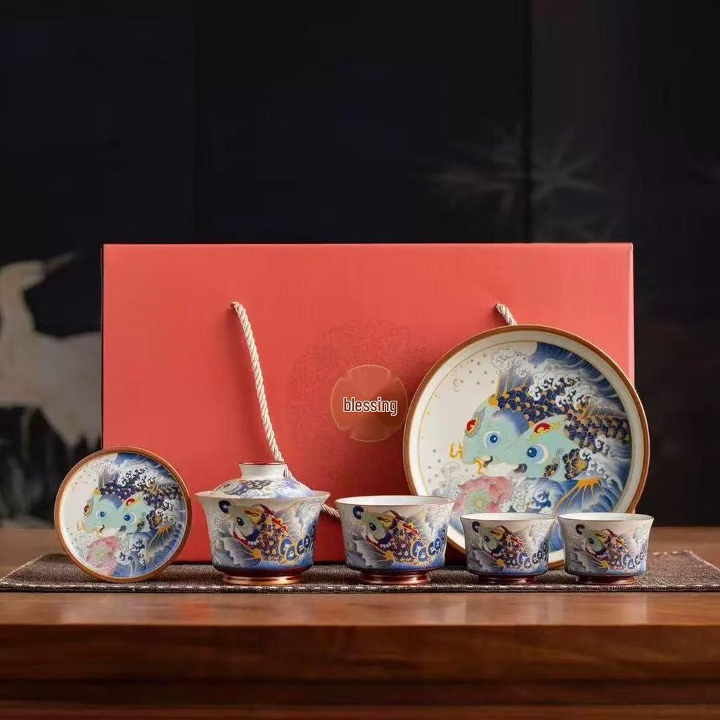 Blue and White Porcelain Lotus Kung Fu Tea Set: Enamel Teacup, Hovering Lid, Teapot, Saucer, and Master Cup.