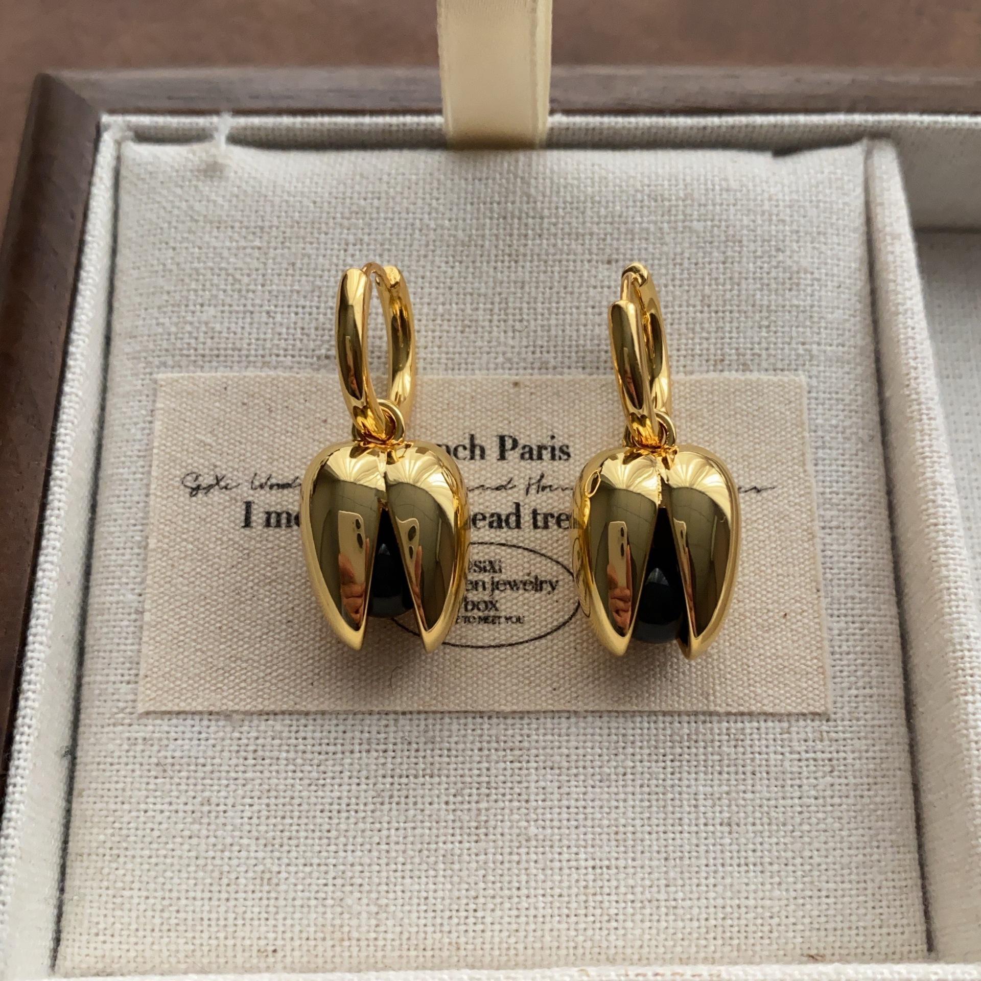 

Three-dimensional tulip bud ear buckle smooth polished transparent earrings unique noble earrings