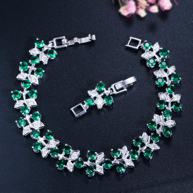 

Ювелирные изделия, Изысканный сверкающий бриллиант, Покрытый швейцарским цирконом браслет из настоящего золота. зелёный