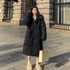 Cappotto imbottito in cotone caldo giallo alla moda per le donne in inverno