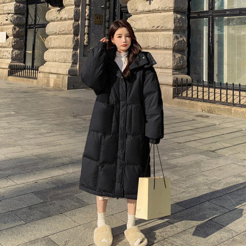 Cappotto imbottito in cotone caldo giallo alla moda per le donne in inverno
