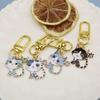 Adorable Alloy Little Cat Keychain Charm for AirPods and Mini Bags