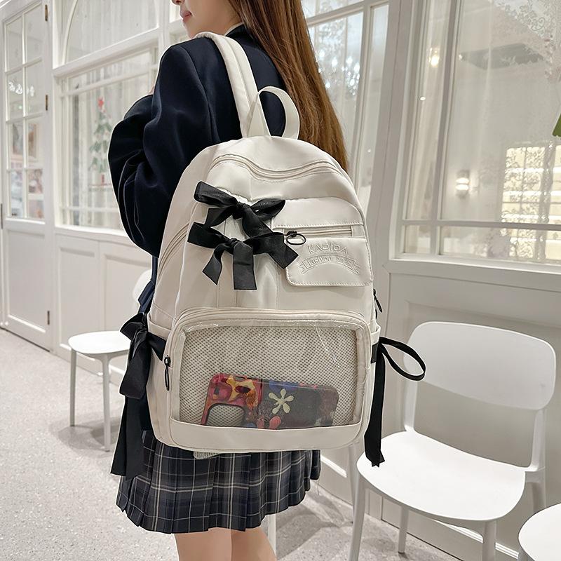 Bow schoolbag female corduroy junior high school students primary school students Internet celebrity backpack large capacity niche backpack