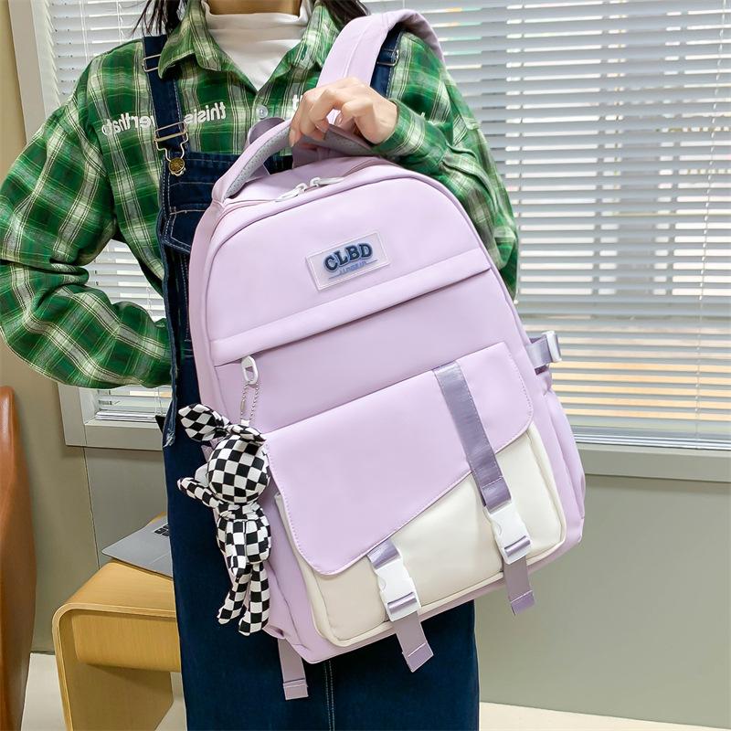 Small fresh color matching and labeling student schoolbag Korean version large-capacity junior high school backpack