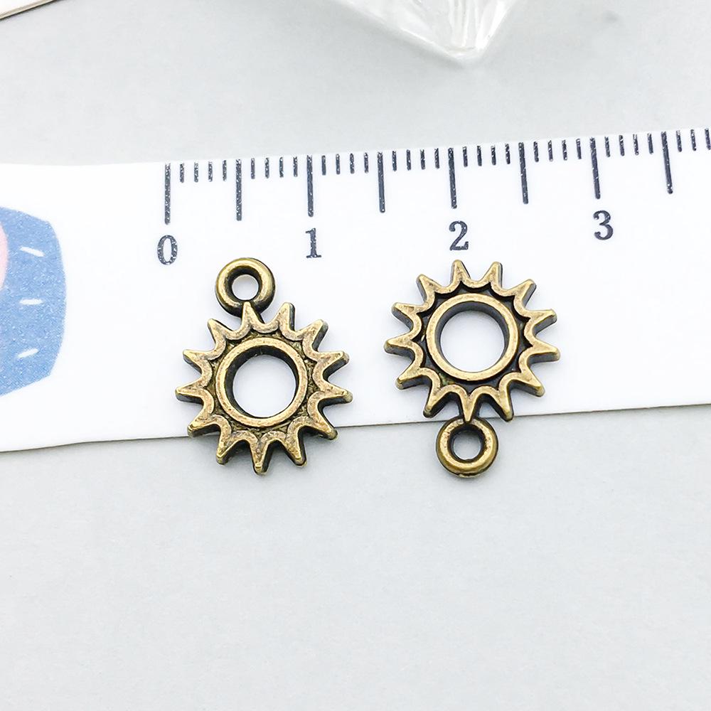 100-Piece Five-Color Alloy Sun, Moon, and Star Pendant Charms for DIY Jewelry