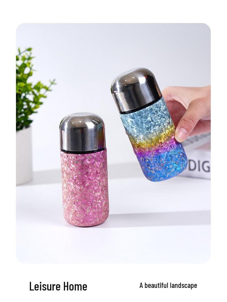 > Sleek Mini Titanium Antibacterial Double-Layer Thermos Cup - Portable, High-Value, Pocket-Sized.