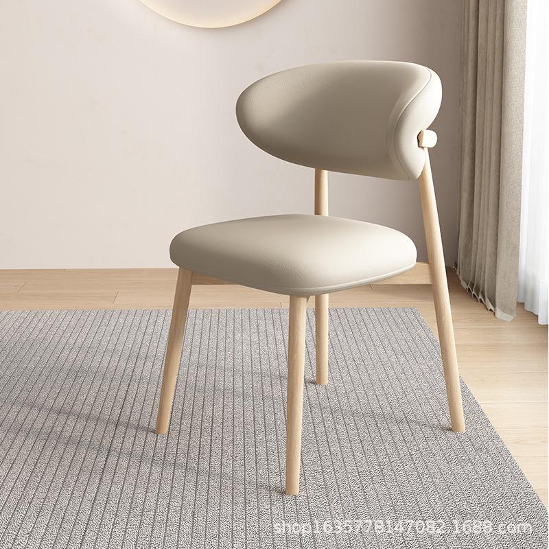 Nordic Modern Minimalist Solid Wood Dining Chair with Soft Pack Backrest - Comfortable Light Luxury Ram's Horn Design for Home, Restaurant, and Hotel.