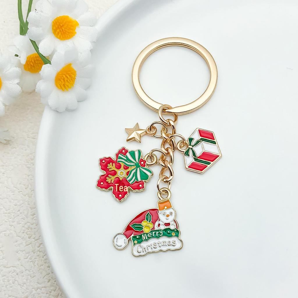 Elegant Christmas Keychain: Gold Snowflake & Snowman Pendant
