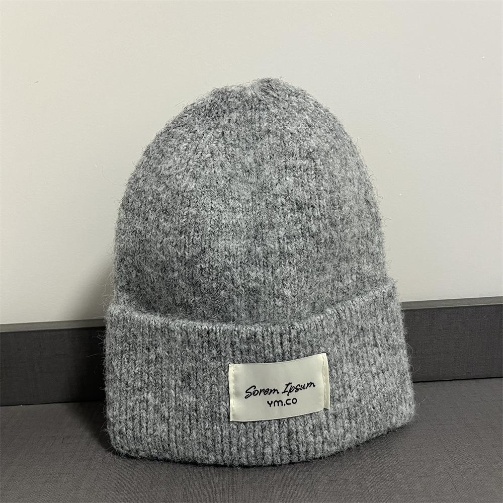 Kleiner Standard-Wollhut Damen warm schlicht retro Herbst und Winter kältefest Schlupfmütze modifiziert die Gesichtsform und zeigt ein kleines Gesicht