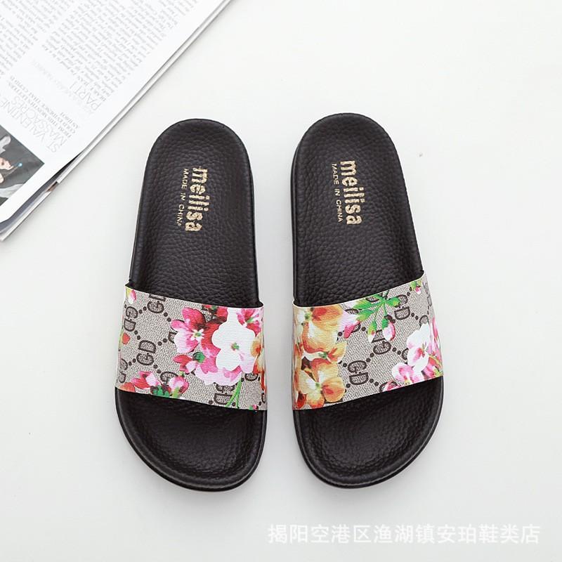 Summer new flat bottom one-word mop fashionable versatile thick soft bottom non-slip flower cloth leather beach cool slippers women's tide