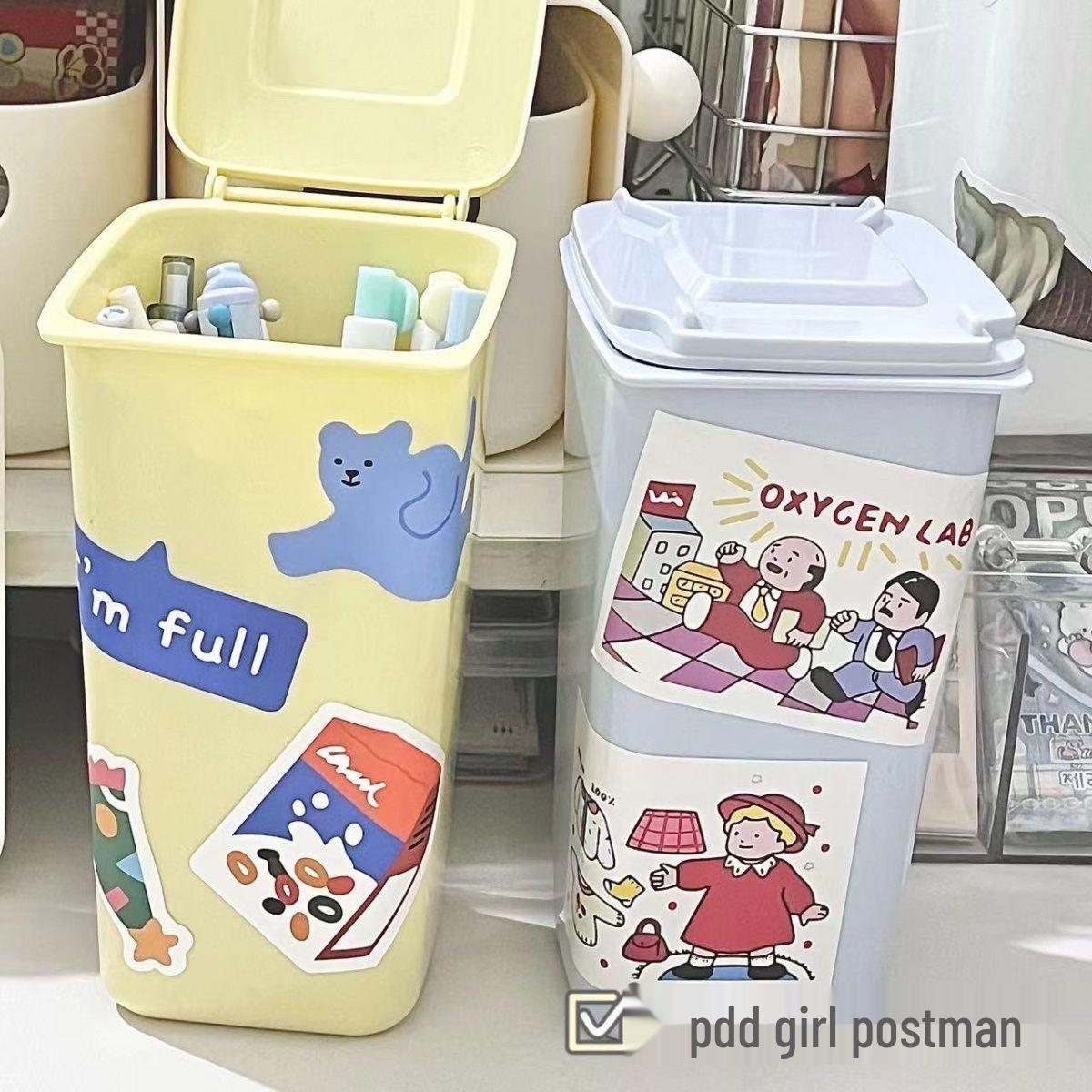 

Desktop Pen Holder and Dustproof Storage Box with Lid - Creative Student Trash Can & Makeup Brush Organizer. Plastic Material [10*6.5*16cm]