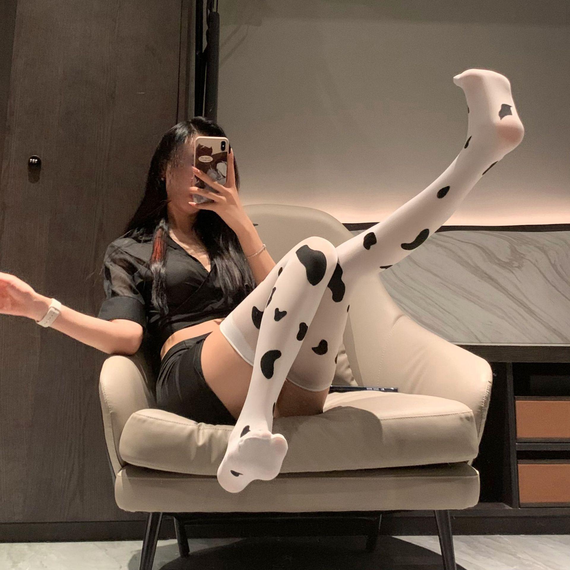 

Cow pattern knee stockings women s thin Japanese cute black and white spotted half socks sexy long thigh socks [picture card packaging] one size fits all