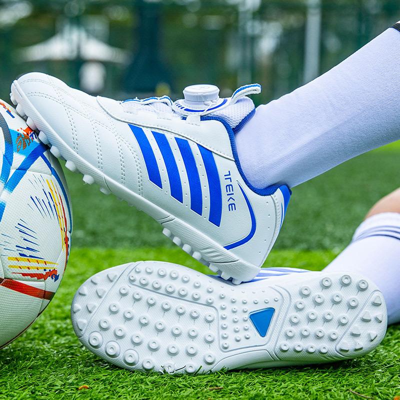 Children's football shoes broken nails rotating buckle leather feet boys and girls students artificial turf anti-skid training shoes