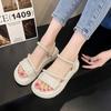 Stepping on shit sandals women's summer 2025 new beach shoes ins trendy fairy wind flat bottom wear non-slip Roman sandals