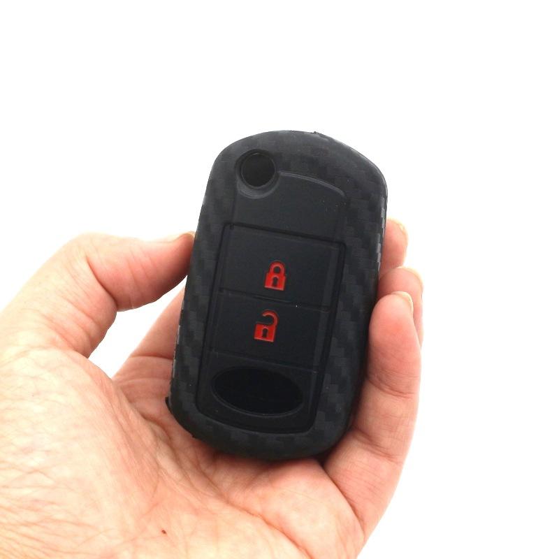 

Silicone key cover for Land Rover Smart 2 buckle car key silicone cover carbon fiber key bag cover anti-drop key cover
