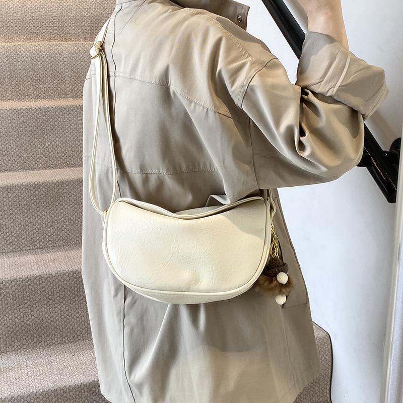 Retro Popular Bag Women's New Niche Design Commuter Shoulder Bag High-end Fashion Messenger Dumpling Bag