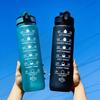 Gradient Large Capacity Sports Water Bottle with Scale, Portable Rope, and Bouncing Straw.