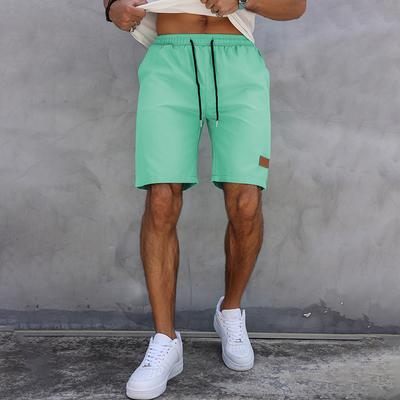 Pantaloncini Estivi Casual da Uomo Pantaloni a Cinque Quarti Classici Tinta Unita Coulisse Etichetta in Pelle