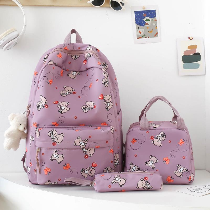 School bag new cute cartoon nylon backpack women's large-capacity middle and high school burden reduction wear-resistant school bag three-piece set