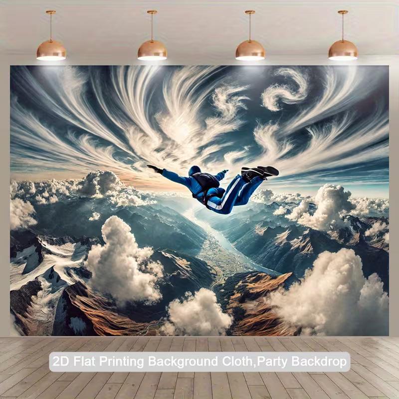 

2D Action Themed Backdrop, Blue Suited Skydiver Above Clouds & Peaks Background 47.2x31.5inch/120*80cm