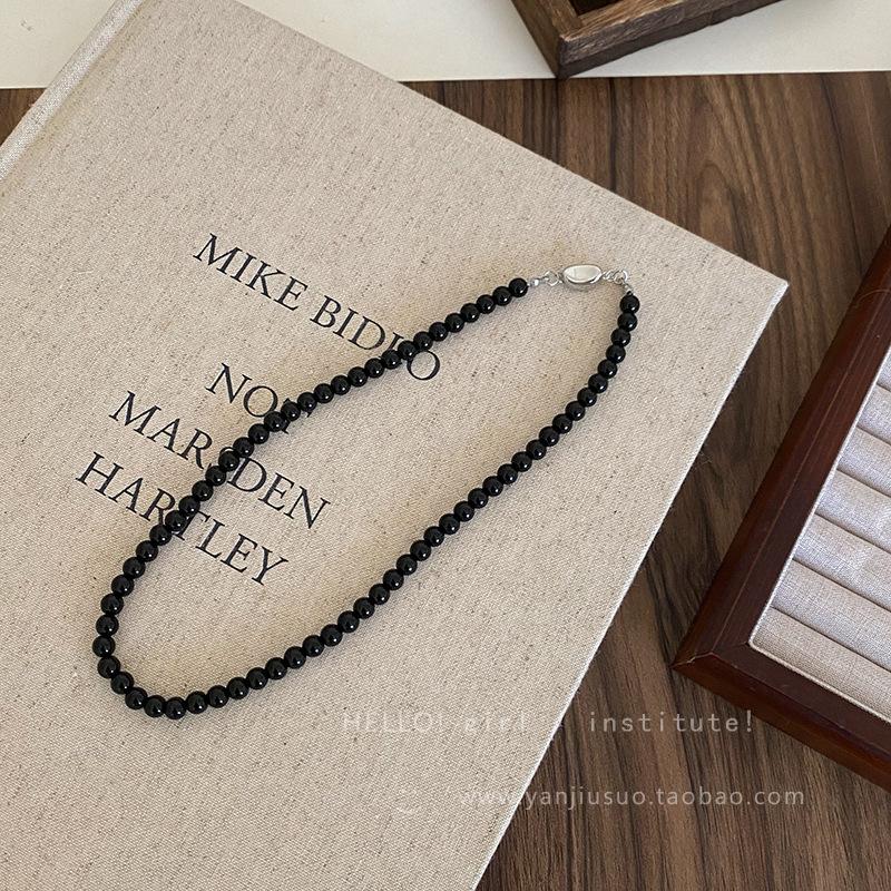 

New black glass pearl beaded necklace women s new popular collarbone chain light luxury niche high-end neck chain