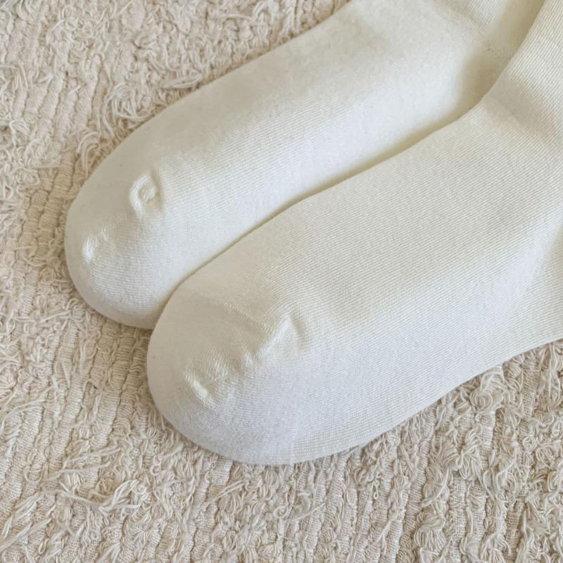 Basic solid color slim calf socks gentle wind soft waxy skin-friendly autumn and winter cotton socks Zhuji pure cotton women's medium tube socks