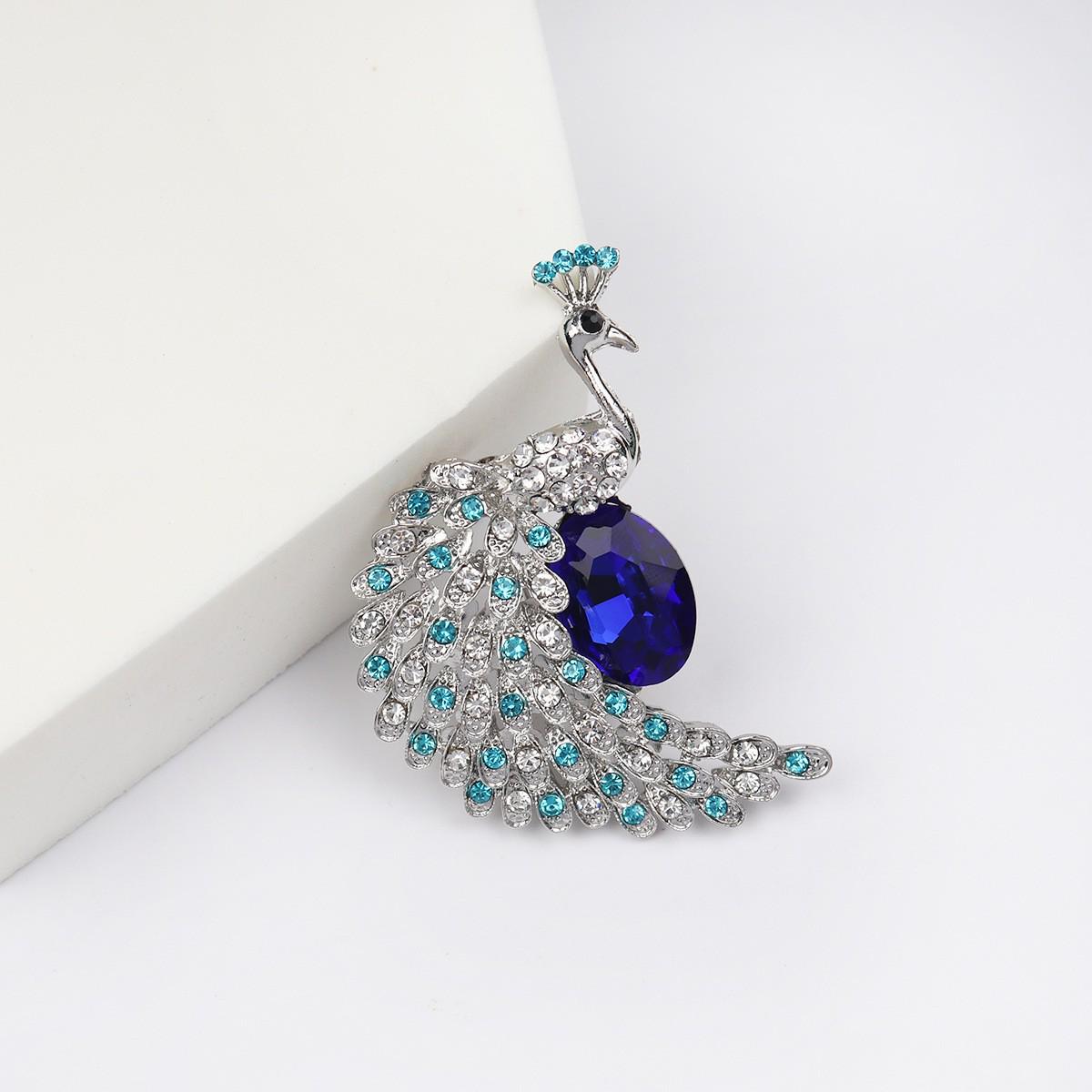 

Брошка Фенікс Павич Сова: Елегантна жіноча шпилька-корсаж