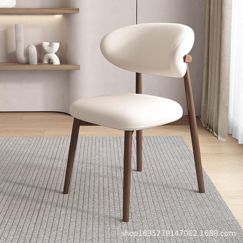 Nordic Modern Minimalist Solid Wood Dining Chair with Soft Pack Backrest - Comfortable Light Luxury Ram's Horn Design for Home, Restaurant, and Hotel.