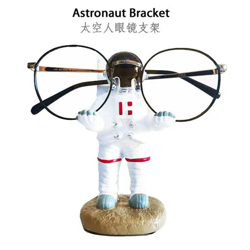 Ständer Astronaut Mehrzweck Halterung Handy / Brille / IPAD / Stift Astronautenfigur Brillenständer Heim Schreibtisch Dekoration
