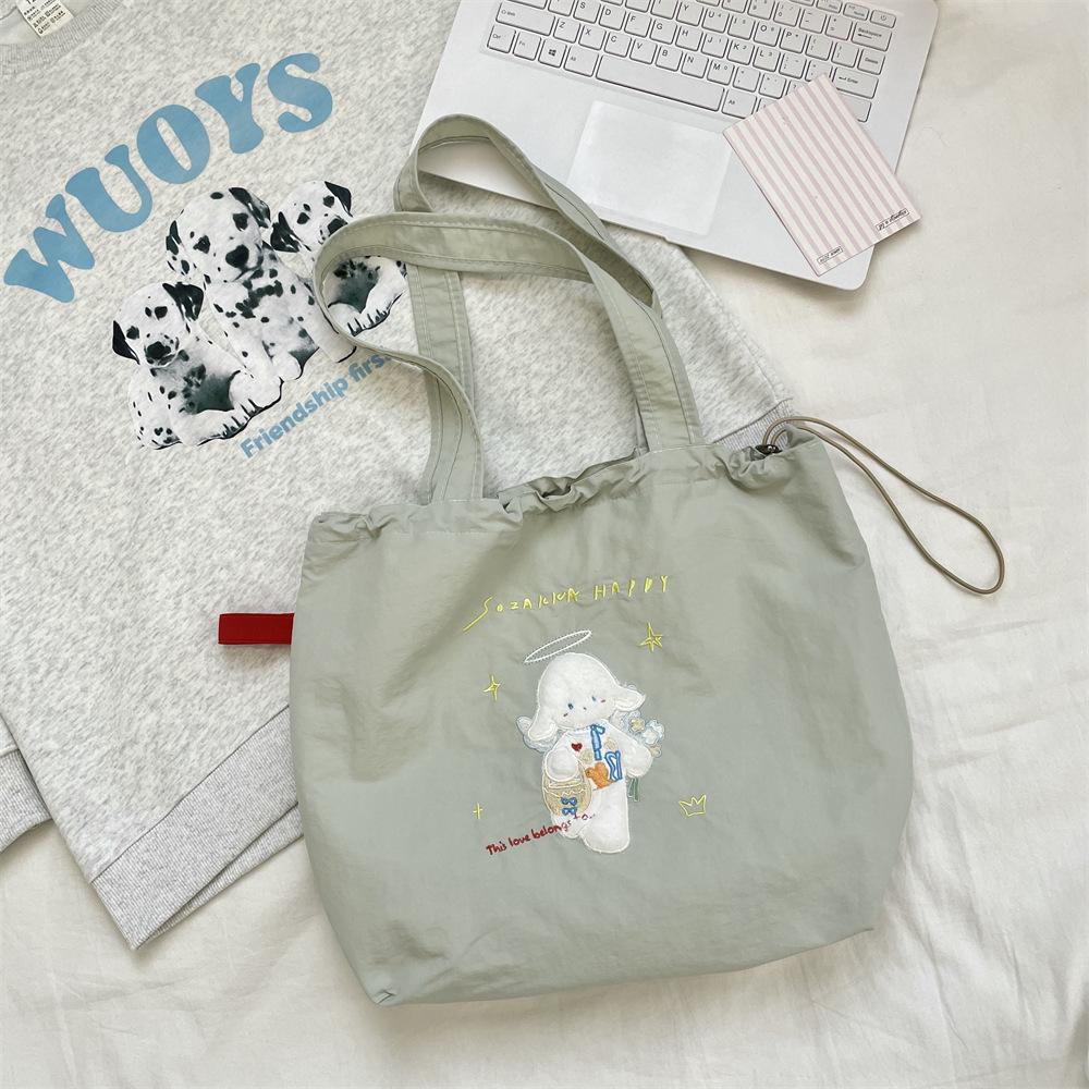 Canvas bag Large capacity women's embroidery lamb fabric bag Simple versatile drawstring bundle shoulder bag