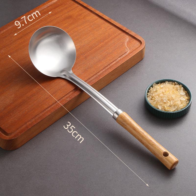 Stainless Steel Cookware Set: Spatula, Soup Ladle, Slotted Spoon with Orange-Brown Wood Handle.