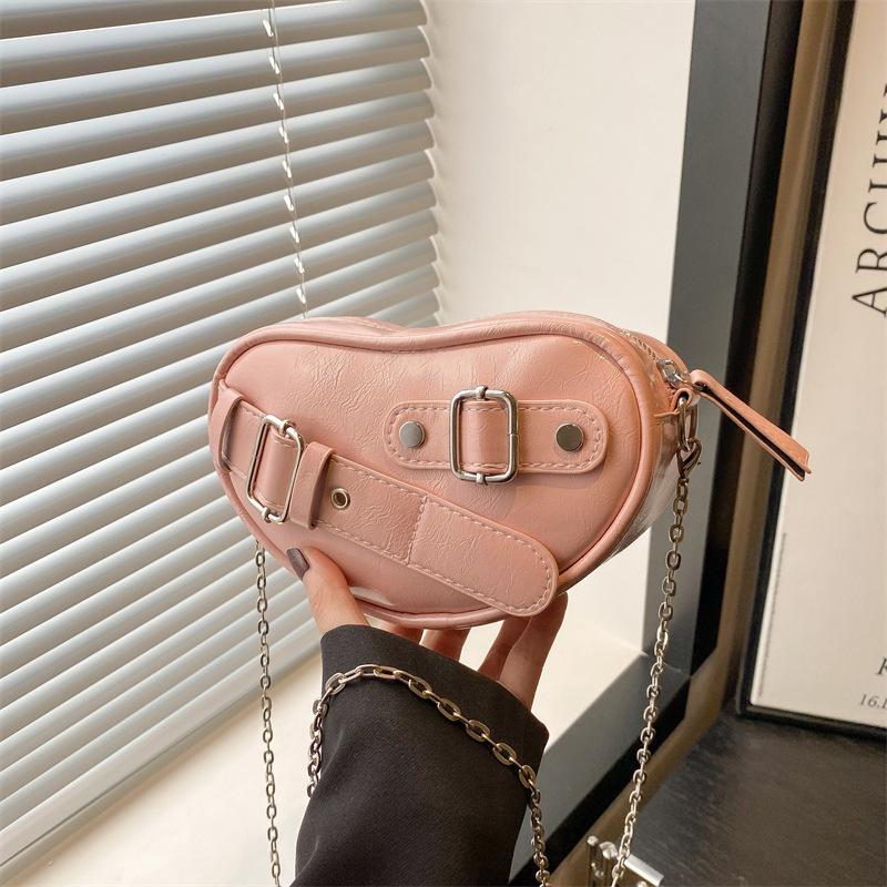

Niche love locomotive wind chain women s bag new trend fashionable sweet shoulder messenger bag рожевий