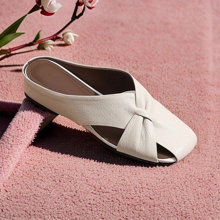 2025 new leather bag head cool slippers women's summer outer wear flat bottom inner height half drag middle heel casual muller leather drag