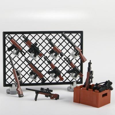 Baustein Puppenmontageszene Zubehör Waffen Ausstellungsständer Baustein