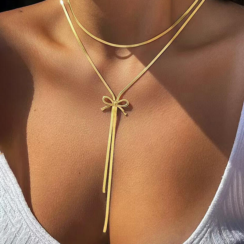 French Style Retro Minimalist Bow Necklaces for Women Ladies Stainless Steel Snake Bone Chains Long Pendant Necklaces Jewelry