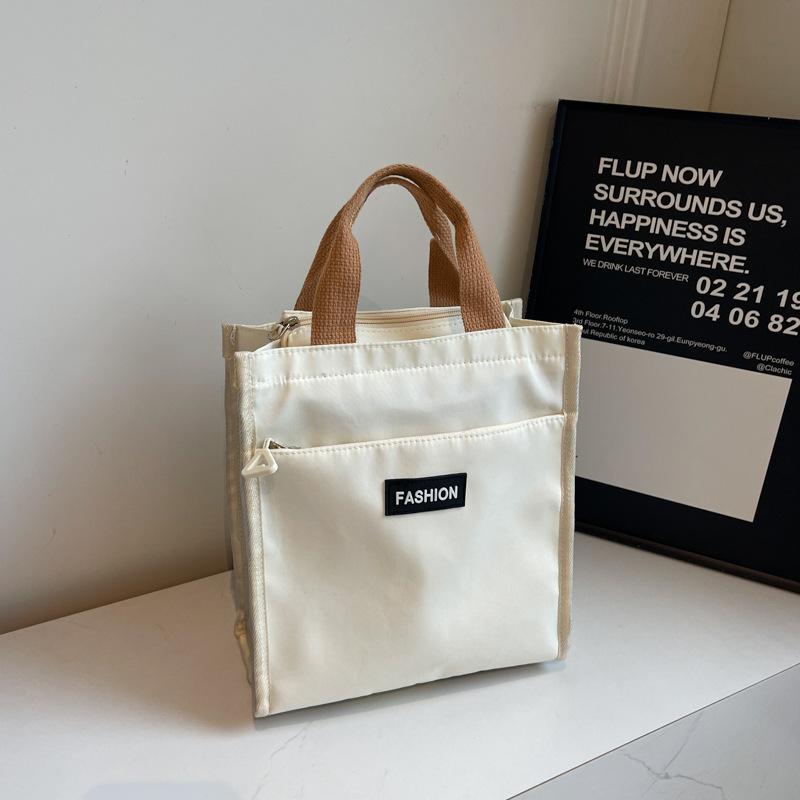 Hand Carry Office Workers Lunch Box Bag Waterproof 2025 Autumn Niche Design Foreign Style Casual Fashion Solid Color Handbag