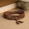 Sandalwood Multi-Circle Beaded Bracelet with 108 Black Flesh Horizontal Grain Prayer Beads for Men and Women.