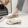 Pinch foot flip-flops women's summer wear 2025 new Internet celebrity sense design sense niche thick heel pearl sandals