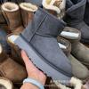 Sheepskin and fur integrated snow boots for women's winter new warm thickened men's short tube thick bottom velvet