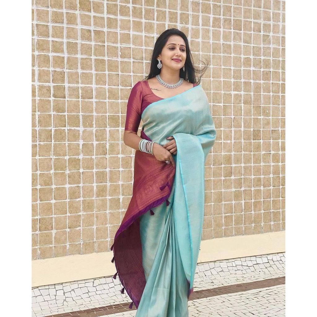 ALMAARI store is adorned with beautiful Zari work in form of traditional motifs. This beautiful saree is elegantly decorated with gorgeous