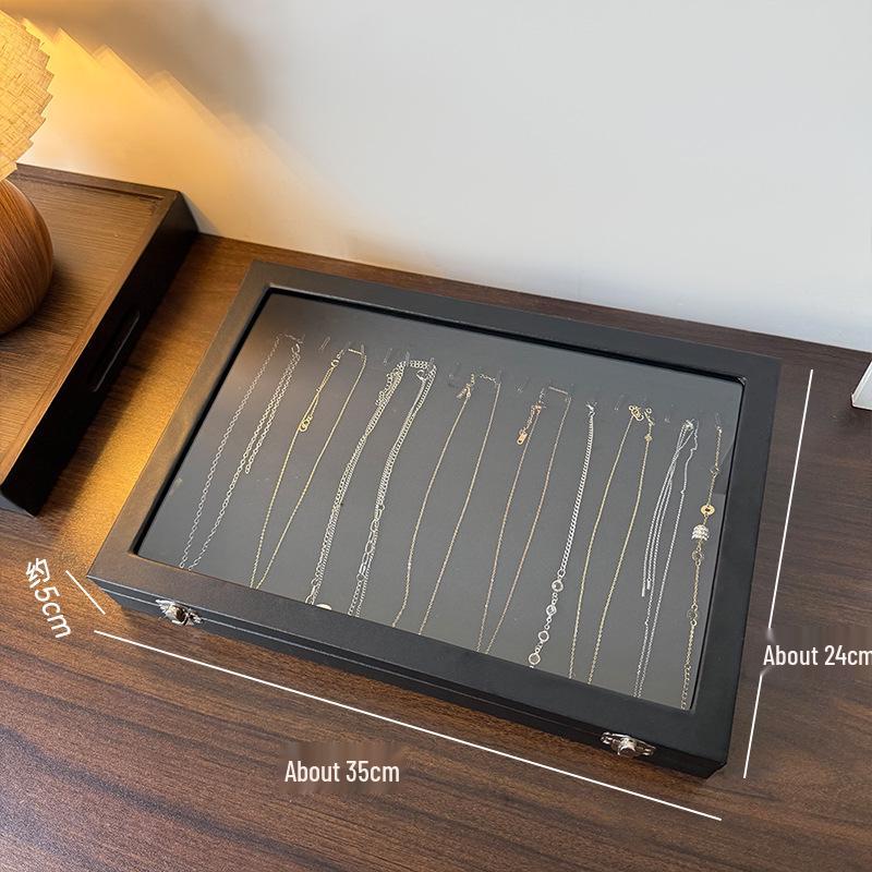

Large Capacity Black PU Jewelry Box with Transparent Glass Flip Lid for Rings, Earrings, and Ornaments