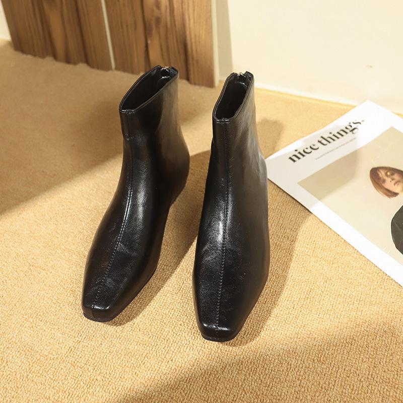 Autumn and winter new imitation leather French retro pointed thin boots low heel and bare boots Martin boots thick heel short boots